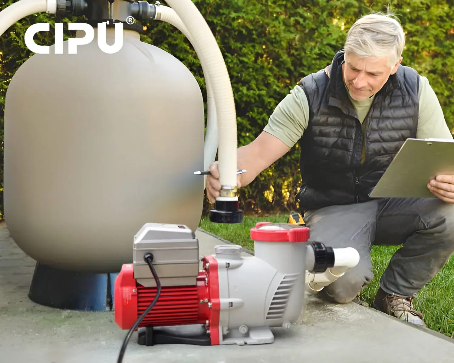 CIPU variable-speed pool pump being reviewed beside a sand filter tank